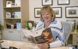 Alicia reading at desk