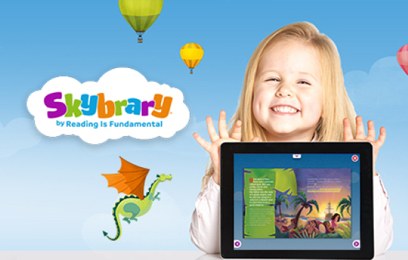 Smiling girl with a tablet